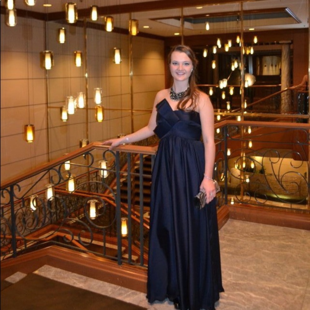 Navy, satin formal dress with a bow statement